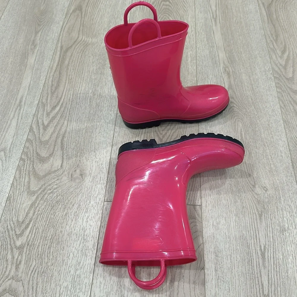 Pink rain boots